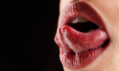 Tongue, lips, mouth. Sexy sensual women's mouth. Healthy teeth and smile, freshness in the mouth. Tongue lick. Female open smiling mouth with sexy lips, sexy tongue.