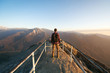 Travel in Sequoia National Park, man Hiker with backpack enjoying view Moro Rock, California, USA