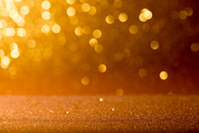 Gold Glitter Vintage Lights Bokeh Abstract Background.