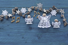Advent  Night With Music Notes, Singing Angels On Wooden Background 