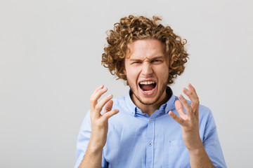 Poster - Portrait of an angry young man wearing shirt