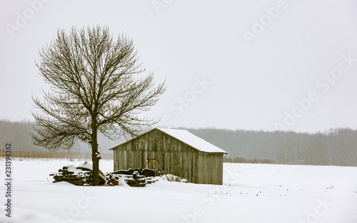 Antique Barn In A Snowy Winter Scene In Rural Quebec Canada