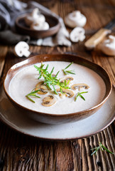 Wall Mural - Creamy mushroom soup served in a bowl