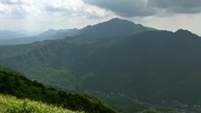 4K, Elevated View Of Mountains WuFenShan In Cloudy Day. Beautiful Mount Wu Fen Shan, Grassy Peak Located On A Ridge Between Keelung And Pingxi In New Taipei City. Landscape Of Hiking Trail Summer-Dan