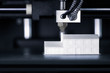 © M.Dörr & M.Frommherz - Modell eines Hauses wird im 3D Drucker erstellt, Konzept Zukunft in der Architektur oder Bauwesen wie Hochbau