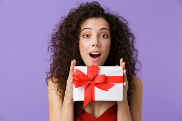 Poster - Portrait of a cheerful woman with dark curly hair