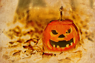 halloween jack-o-lantern on autumn leaves