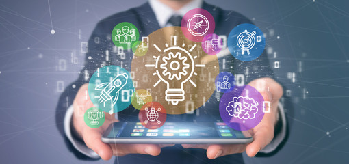 Poster - Cloud of colorfull start up icon bubble with data Businessman holding a binary 3d rendering