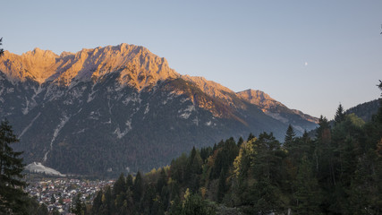 Golden hour lightning up mountain top