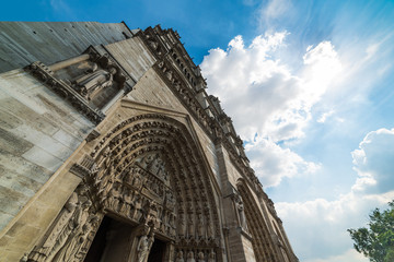 Canvas Print - Notre Dame cathedral in Ile de la cite under a blue sky