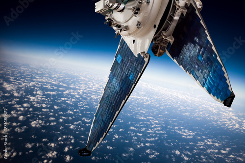 Space satellite over the planet earth