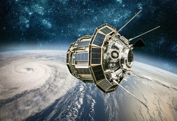 Wall Mural - space satellite monitoring from earth orbit weather from space, hurricane, typhoon on planet earth.