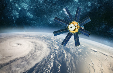 Wall Mural - space satellite monitoring from earth orbit weather from space, hurricane, typhoon on planet earth.