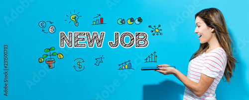 New job with young woman using her tablet Lerretsbilde