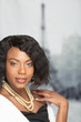 © terryleewhite - Young African-American Woman in front of Eiffel Tower in the Winter