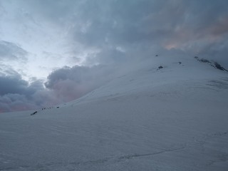 sunrise in snowy mountains