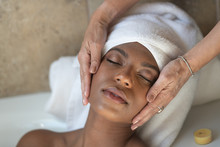 Young African-American Woman Spa Treatment Relaxing