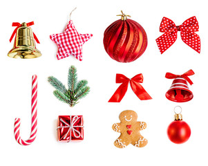 Collection of Christmas objects  for mock up template design. Red bauble, fir tree branches, stars  and gingerbread man   isolated on white background close up.  Flat lay, top view