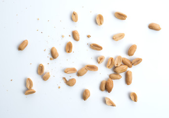 Canvas Print - Roasted salted peanuts isolated on a white background