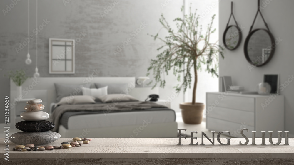Wooden vintage table shelf with pebble balance and 3d letters making the word feng shui over blurred bedroom with window, chest of drawer and big olive tree, zen concept interior design - obrazy, fototapety, plakaty 