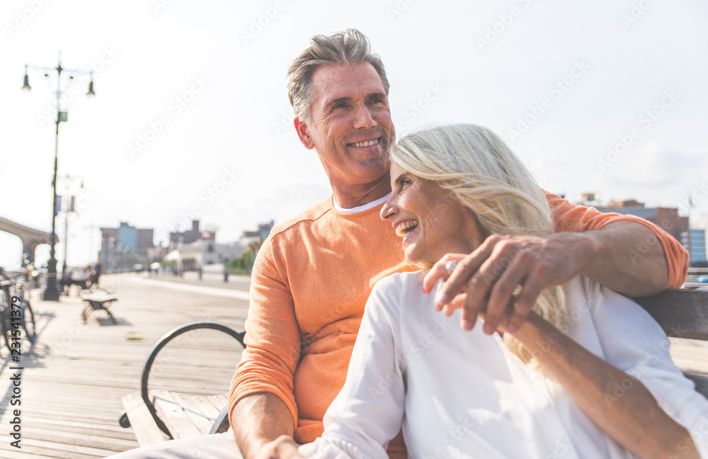 Happy senior couple spending time at the beach. Concepts about love,seniority and people - obrazy, fototapety, plakaty 