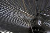 Fototapeta Dmuchawce - Detail of spokes from the bicycle wheel. Macro.