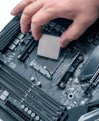 Poster - Installing processor unit into computer motherboard.