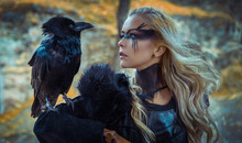 Beautiful Black Crow, Viking Blonde Woman With Shield And Sword, Braids In Her Hair.