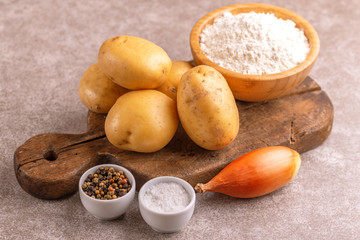 Wall Mural - Ingredients for traditional potato pancakes or latke Hanukkah celebration