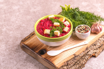 Wall Mural - Bright tasty pureed beetroot soup with ingredients. Healthy food