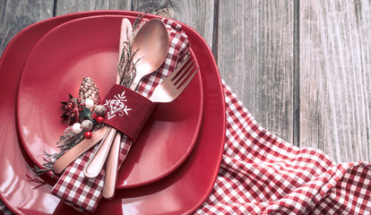 Wall Mural - Christmas dinner cutlery with decor on a wooden background