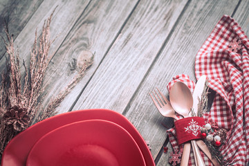 Wall Mural - Christmas dinner cutlery with decor on a wooden background