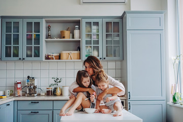 happy family having fun in the kitchen