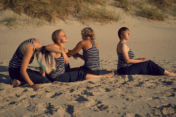 Wall Mural - Group of women engaged in body therapy in nature