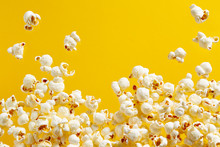 Popcorn On Yellow Background