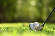 © amenic181 - Golf ball on green grass ready to be struck on golf course background