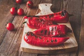 Sticker - Grilled red peppers on the wooden board