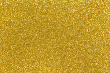 Wall Mural - golden glitter shiny texture background for christmas, celebration concept.
