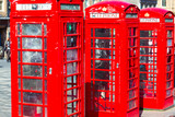 Fototapeta Natura - Old red telephone booths Royal mile street in Edinburgh