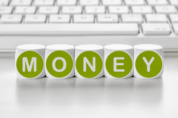 Wall Mural - letter dice in front of a keyboard - money