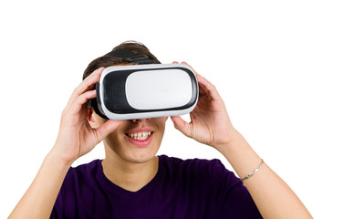 Portrait of a young man in a purple t-shirt experiencing virtual reality with the help of WR glasses.