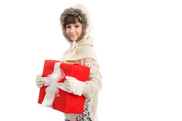 Wall Mural - Little girl with big red box, isolated on white background. Christmas gift.