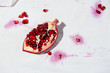 © Lauren Allen - Pomegranate on white surface