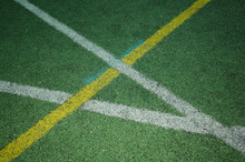 Yellow And White Boundary Lines On Sports Field
