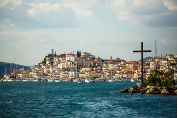 Poros island, view of the coast from the sea Harbor, Greece, Aegean sea.