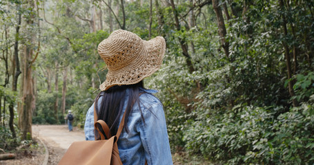 Canvas Print - Woman go hiking in forest