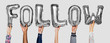 © Rawpixel.com - Hands showing follow balloons word