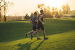 © realstock1 - The two sportsmen running on the grass in the park
