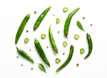 Flat Lay Composition With Green Chili Peppers On White Background