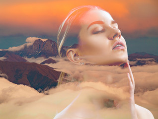 Double exposure of young beautiful woman and clouds sea.